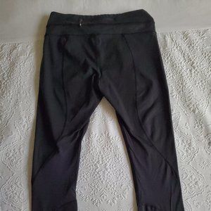 Lululemon black athletic paints, size 4, slight pattern on paints